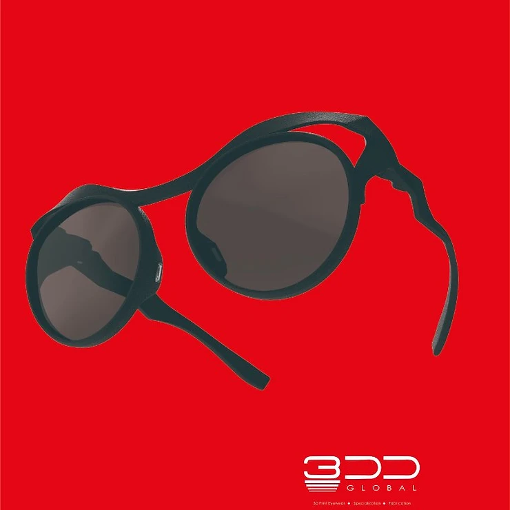 3D printed black round eyewear on red background