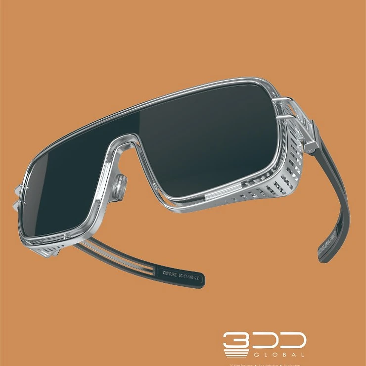 Silver wrap-around shield eyewear on muted orange background